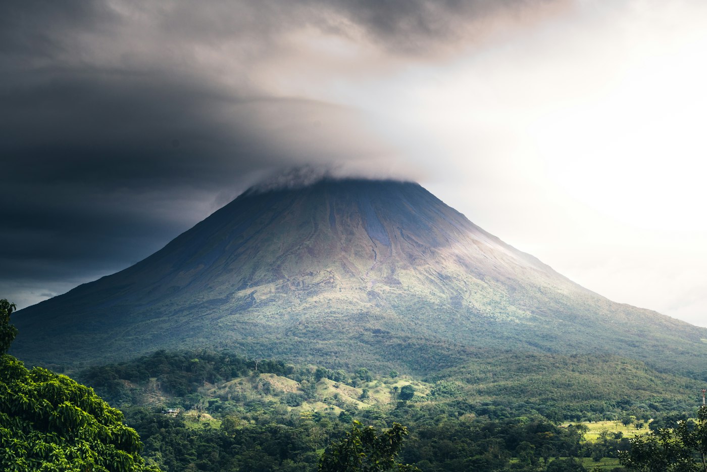Arenal Volcano surrounded by rainforest in Costa Rica